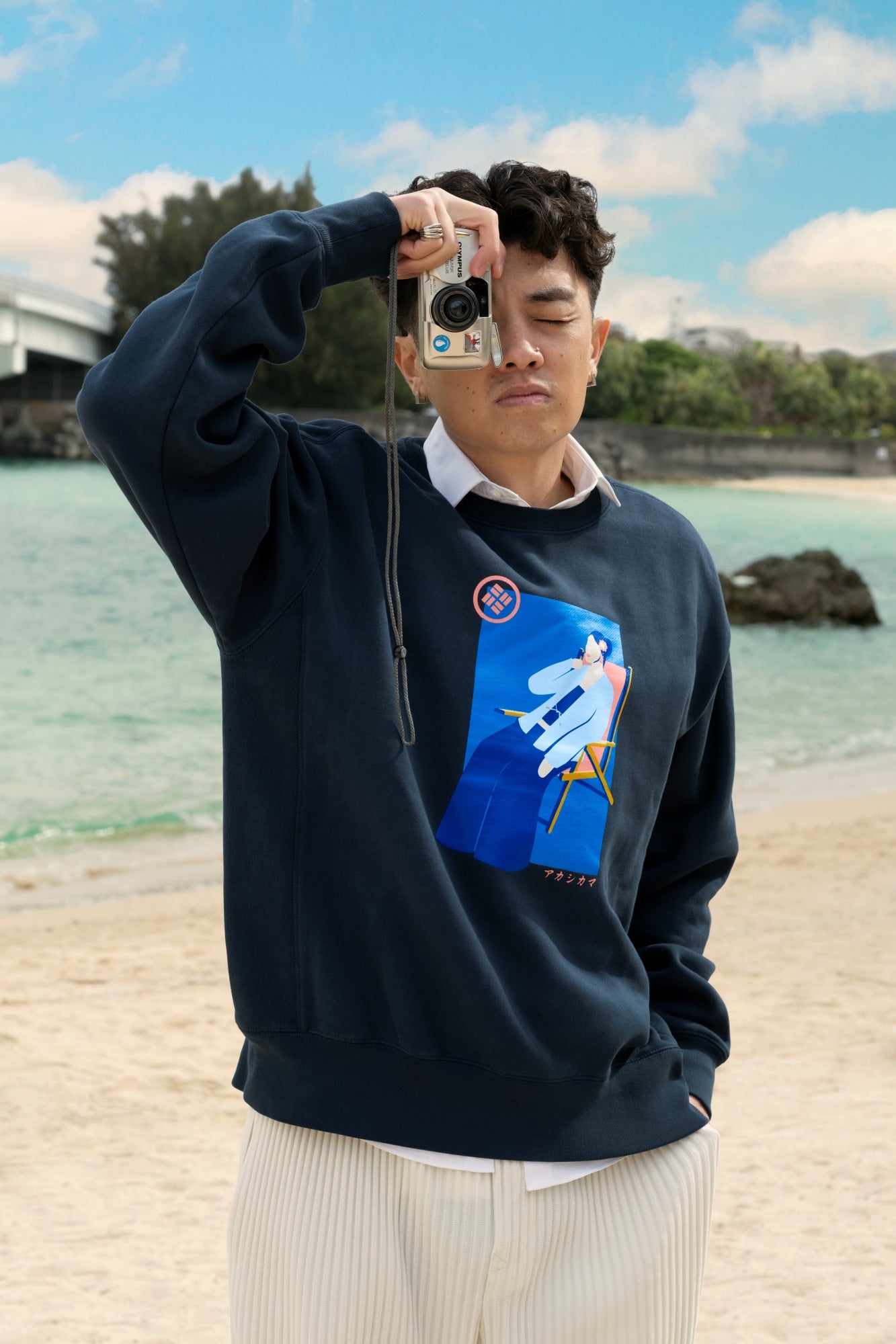 Akashi-Kama men’s indigo garment dyed crewneck Japanese streetwear with hand-illustrated Riviera woman graphic