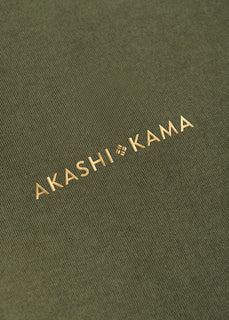 Metallic gold 3D silicon stamped logo on AKASHI-KAMA Olive tee