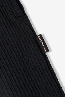 AKASHI KAMA Flag tag detail Pleated Pants