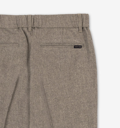 Mocha Taupe pleated trousers pocket and 
AKASHI-KAMA label back detail