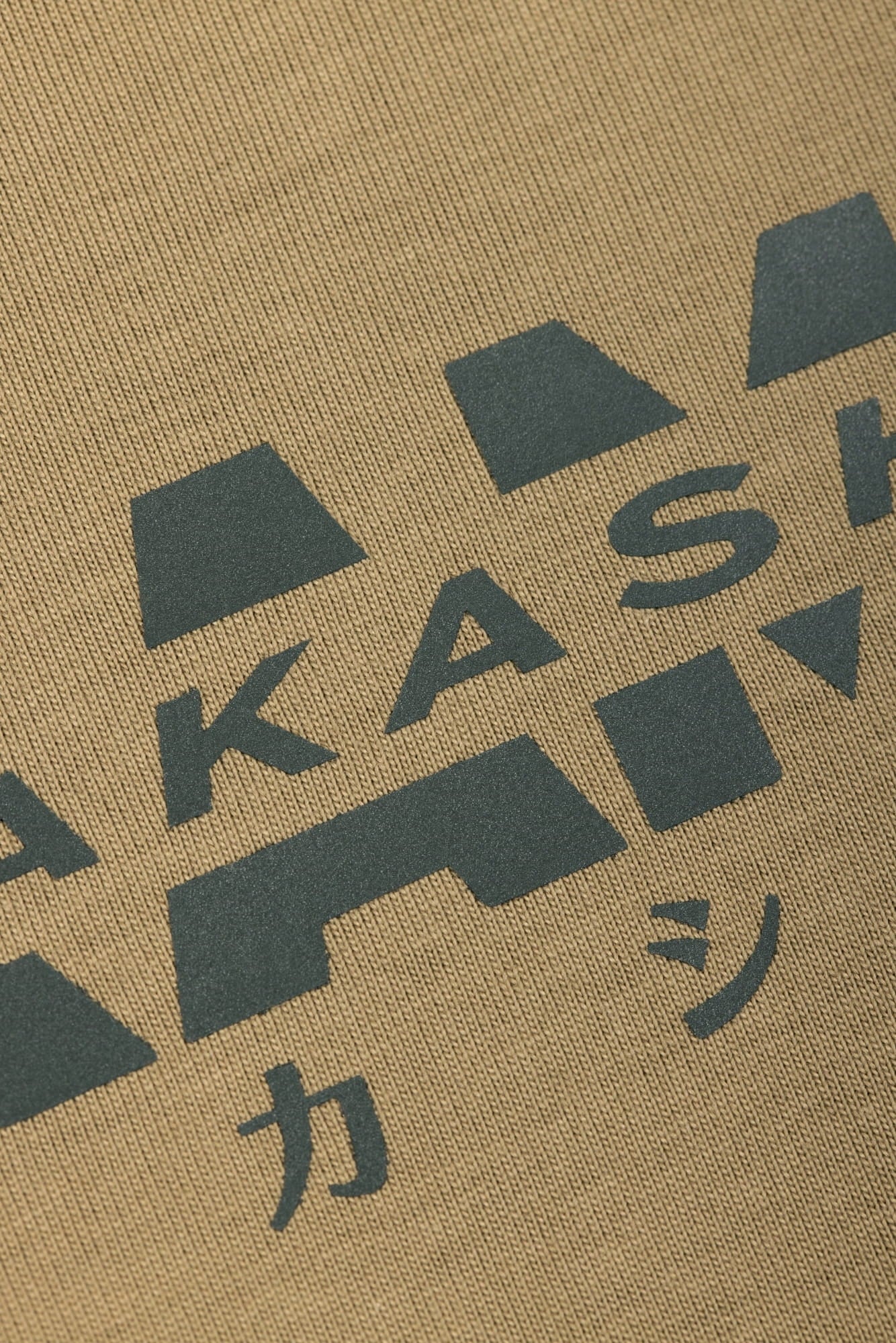 3D silicon reflective track logo on AKASHI-KAMA Tan tee